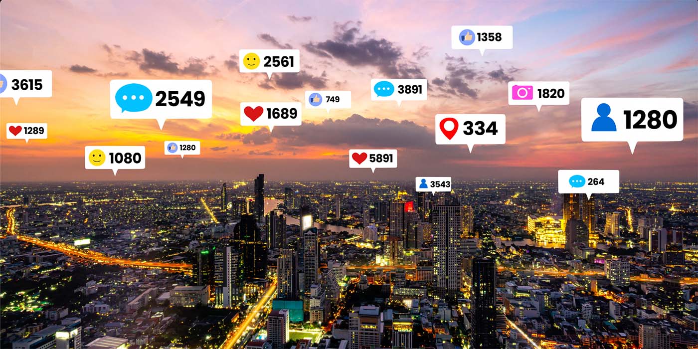 cityscape overlaid with social media icons