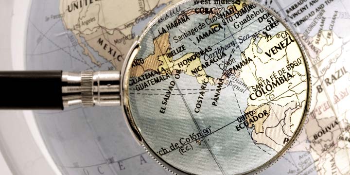 magnifying glass over map of Central America